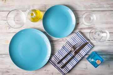 table setting coordinated in blue and white