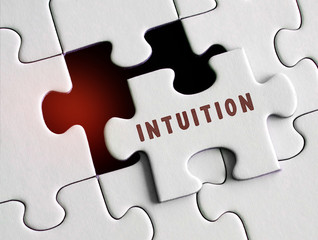 Intuition text on puzzle background. - obrazy, fototapety, plakaty
