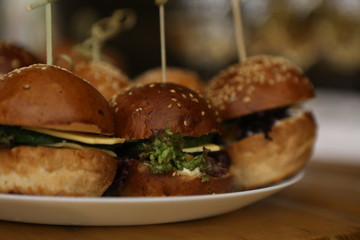 sandwich bread meat cheese greens white plate