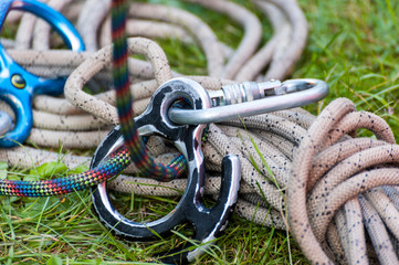 Fototapeta na wymiar Climbing sports image of a carabiner on a rope