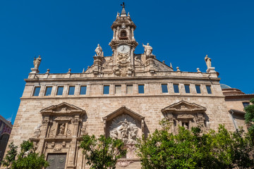 Santos Juanes church (San Juan del Mercado) adjacent to Vaelncia's Central Market and facing the Llotja de la Seda building.Valencia, Spain.
