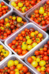 Fresh tomatoes on market stall