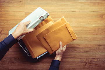 Male hand open safety box metal and Important document paper inside.Business management.security...