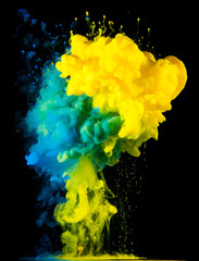 Paint drops from above mixing in water. Ink swirling underwater. Yellow, blue, green colors.