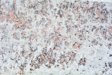 Texture of polished granite stone floor with white dense mud like chalk or lime