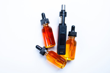 vaping device. E-cigarette for vaping. Vape concept. Vaping mod e-cig with tank atomizer and juice...