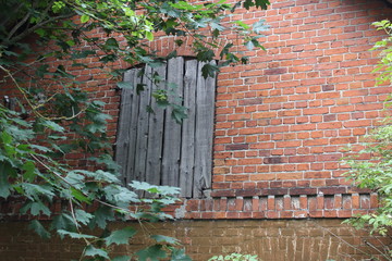 old brick wall with window