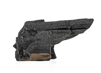 One piece of charcoal isolated on white background. Natural wood.