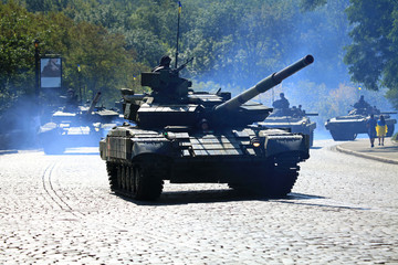 Kyiv, Ukraine - August 24, 2018: Modernized tаnks T-64 BV are driving over the city streets. Military technique parade in Kiev. Independence day celebration. Military equipment of the armed forces 