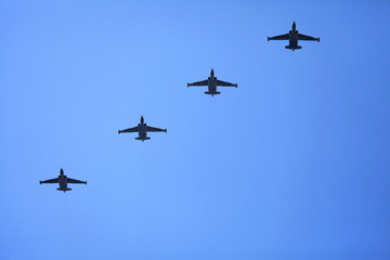 Kyiv, Ukraine - August 24, 2018: Warplanes (armored attack aircraft Su-25) in the sky during the military technique parade in Kiev. Independence day celebration. Military equipment of the armed forces