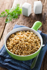 Fresh homemade roasted or fried cauliflower rice in bowl (Selective Focus, Focus one third into the image)