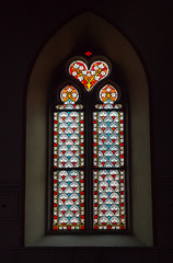 Fototapeta na wymiar close up view of an ornate stained glass window
