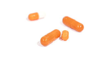 tablets orange, isolated on a white background. medicine.