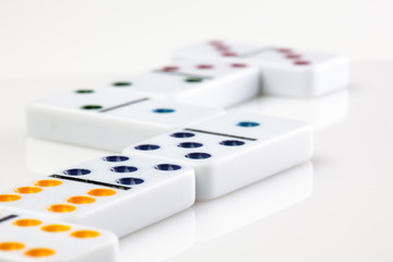 Domino isolated on white background photo for your leisure projects or board games publications. Closeup.