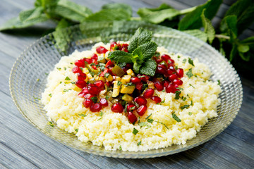 Cus cus salad with pomegranate and mint.