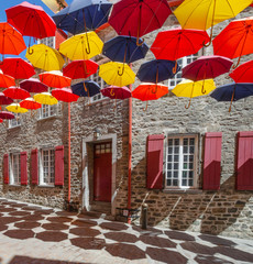 Fototapeta na wymiar Multicolored Hanging Umbrellas