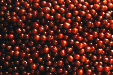 Lots of cherries on the table. Red berries cherries. Cherry background