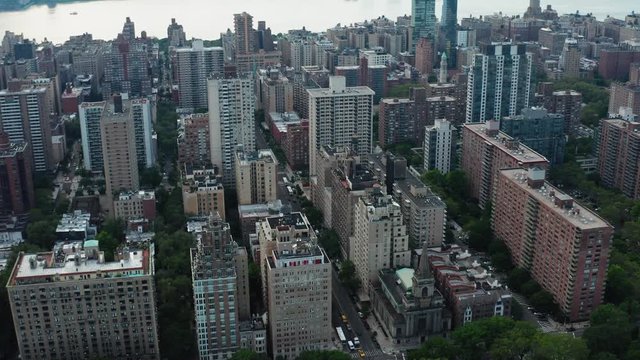 Aerial shooting of New York's streets. View on buildings and skyscrapers from sky. Cityscape view of Manhattan from a drone. 