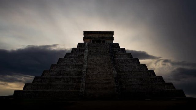 Maya Pyramid: Time Lapse at Sunrise with Dark Silhouette of Mayan Kukulcan Temple, Chichen Itza, Yucatan, Mexico