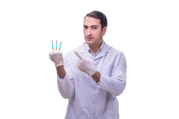 Young handsome doctor with syringe isolated on white