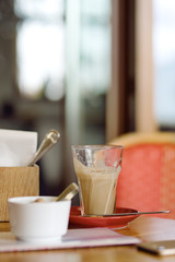 Large cup of coffee latte on a table