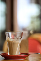 Large cup of coffee latte on a table