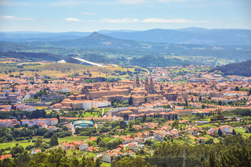 Panorama of saint city Santiago de Compostela. St James of Compostella is the capital of the autonomous community of Galicia, in northwestern Spain. Destination of Way of St James pilgrims walk. - obrazy, fototapety, plakaty
