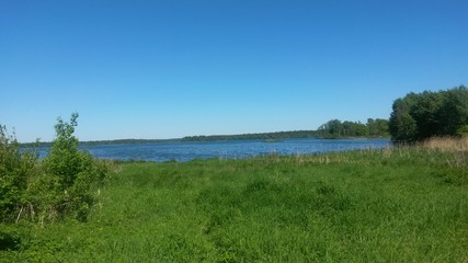 landscape with lake and blue sky