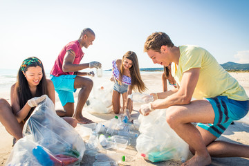 Volunteers collecting plastic on the beach