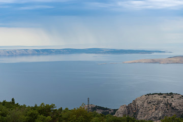 Aerial view of a bay and island in Croatia. Rainy day