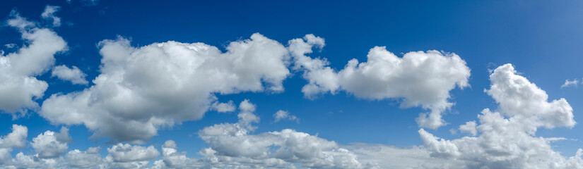Obraz premium panorama of white clouds in a blue sky