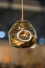 Modern streamlined mirror copper chandelier. Metal gold shaped pendant lamp interesting form. Loft style