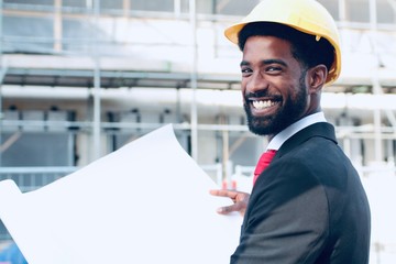 Construction worker and architect outside