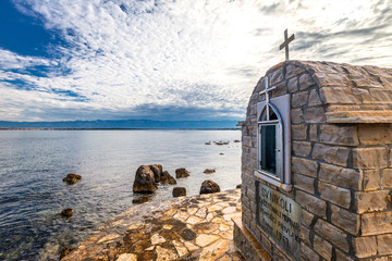 St Nicholas' Chapel on the shore of the Adriatic Sea. View from Privlaka village in the Zadar County of Croatia, Europe.