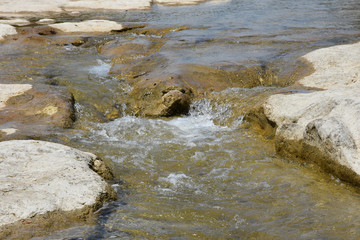 water flowing over rocks