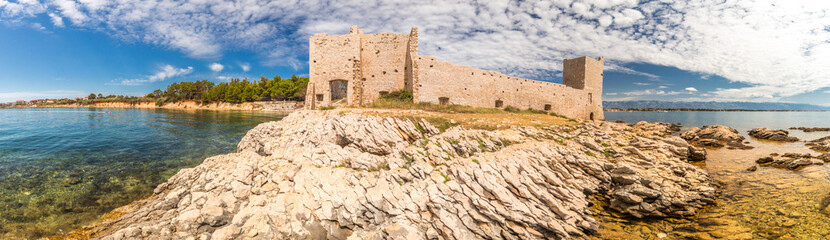 Fototapeta na wymiar Panorama view of Kastelina castle, fortress ruins on Vir island, Croatia, Europe.
