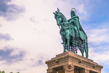 Fototapeta premium Budapest - June 22, 2019: Statue of Stephen I at the Fisherman's Bastion in the Buda side of Budapest, Hungary