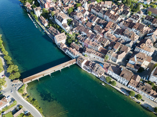 Aerial image of Swiss old town Diessenhofen with old wooden covered bridge over the Rhine river, Canton Thurgau, Switzerland