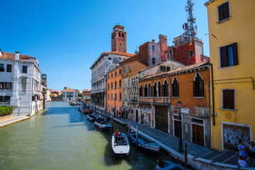 Fototapeta na wymiar Venice, Italy - July, 07, 2019: cityscape with the image of channel in Venice, Italy