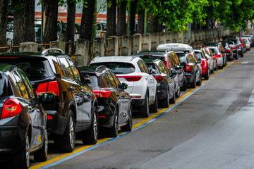 Verona, Italy - July, 28, 2019: cars parked on the street in Verona, Italy