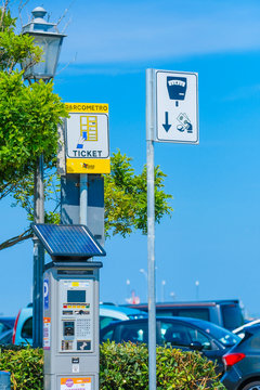 Sotomarina, Italy - July, 2q, 2019: car's parking machine on the parking in Sotomarina, Italt