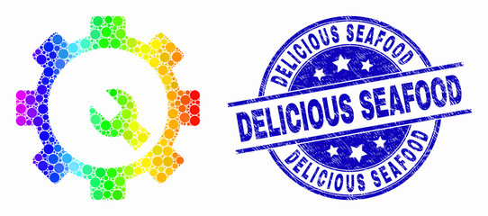 Pixelated bright spectral setup tools mosaic icon and Delicious Seafood seal. Blue vector rounded grunge seal stamp with Delicious Seafood caption. Vector collage in flat style.