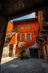 Fototapeta na wymiar Verona, Italy - July, 11, 2019: dwelling houses in a center of Verona, Italy