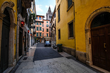 Fototapeta na wymiar Verona, Italy - July, 11, 2019: street in a center of Verona, Italy