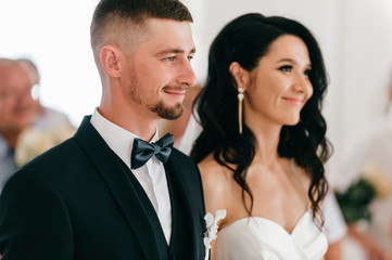 Beautiful wedding couple indoor portrait.