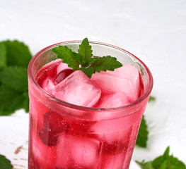 summer refreshing drink with berries of cranberries