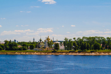 Uglich, Russia - June, 17, 2019: embankment of Volga river in Uglich, Russia with a view to .Resurrection monastery