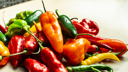 jalapeños, oranges, reds and greens from Colombia