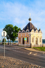 Fototapeta na wymiar Rybinsk, Russia - June, 10, 2019: small church on Volga embankment in Rybinsk, Russia