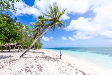Tourist on a tropical beach in the Philippines